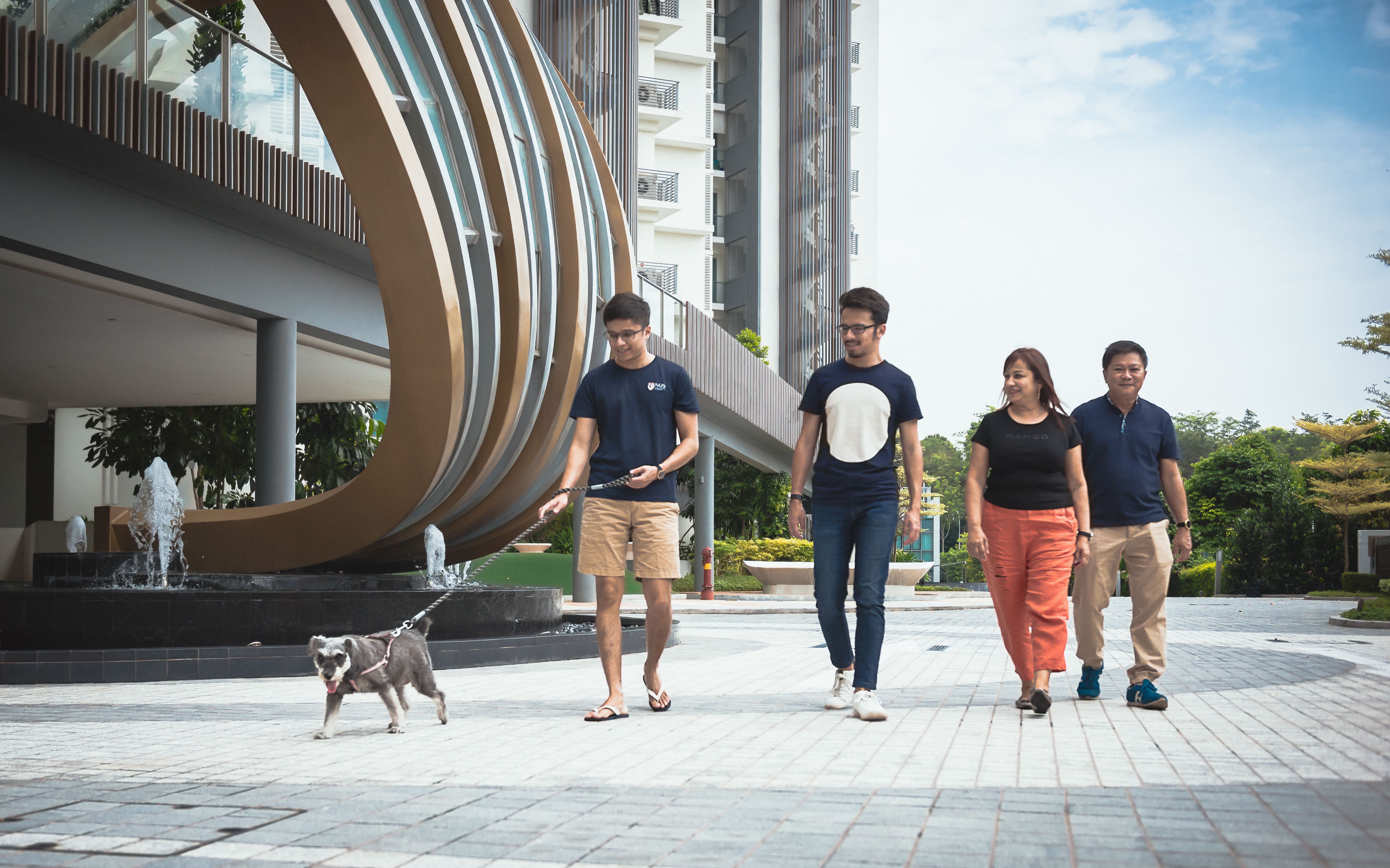 Family on a walk with dog